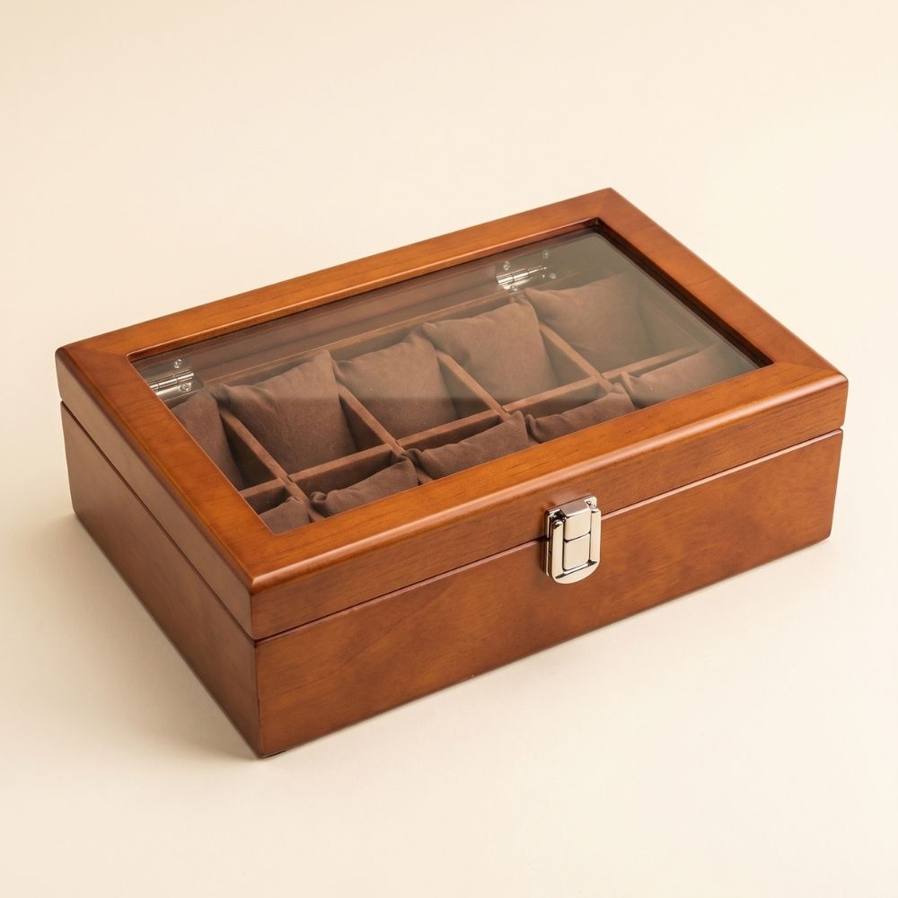 Boîte à montre Le Comptoir X en bois ambre, couvercle vitré et dix coussins de suédine brune