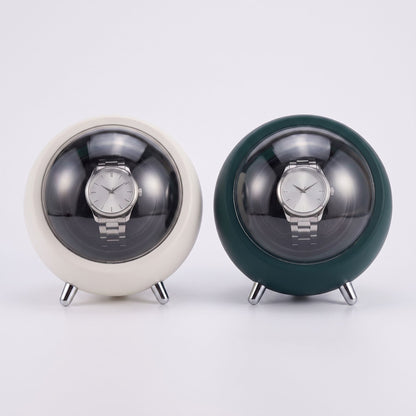 Les deux coloris du remontoir de montre La Capsule, blanc et vert bouteille, côte à côte