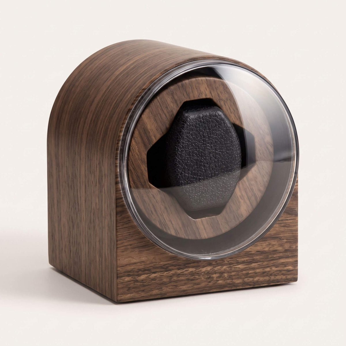 Remontoir L'Arche pour une montre automatique, coffret arrondi aspect noyer et hublot bombé transparent