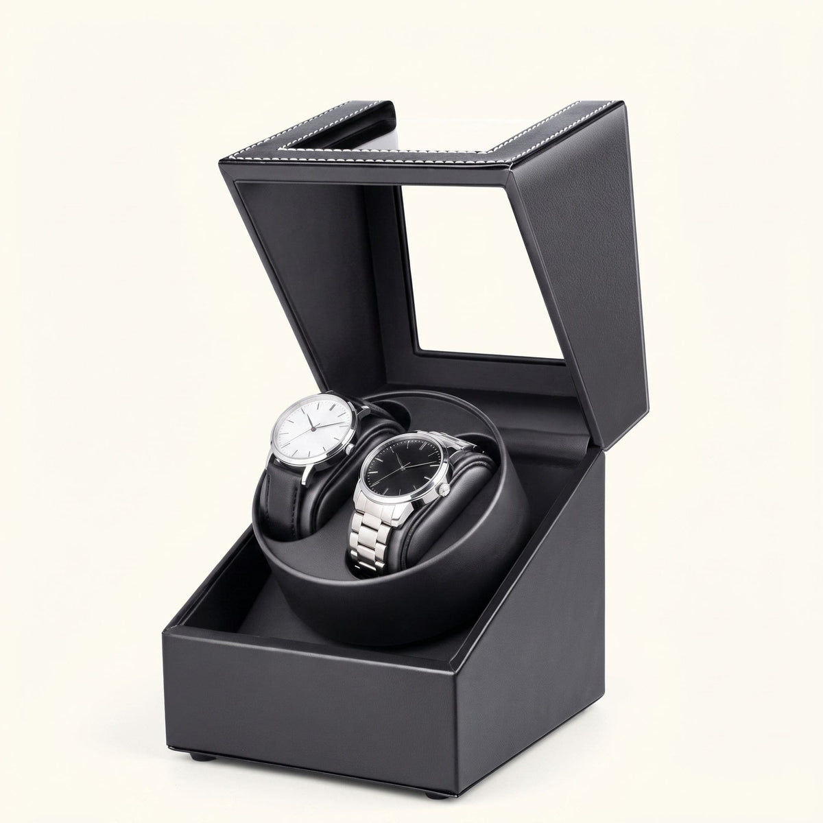 Remontoir L'Écrin Duo noir ouvert, deux montres posées sur le tambour rotatif